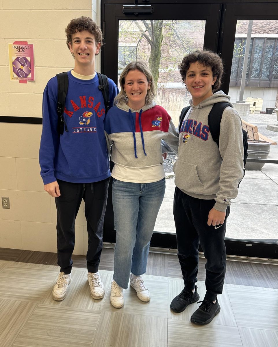 College counselor Laura Nelson repping the University of Kansas with seniors Zac Wood and Mikey Haider on College Decision Day!